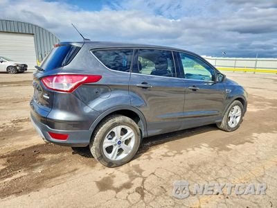 Trzecie zdjęcie samochodu z tyłu: 2016 FORD ESCAPE SE VIN:1FMCU0GX2GUB98129 - miniatura