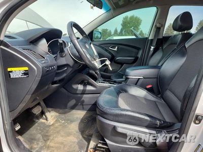 Zdjęcie 7 z 12 samochodu: 2012 HYUNDAI TUCSON GLS VIN:KM8JUCAC1CU430213 - miniatura