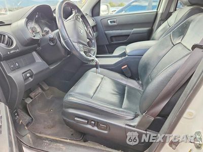 Zdjęcie 7 z 12 samochodu: 2014 HONDA PILOT TOURING VIN:5FNYF4H93EB027715 - miniatura