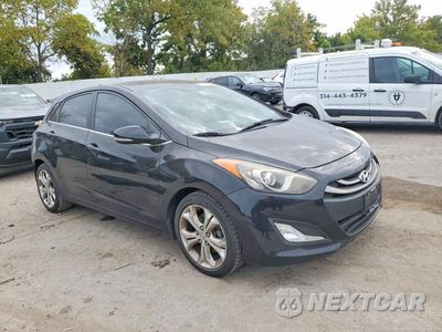 Czwarte zdjęcie samochodu z boku: 2014 HYUNDAI ELANTRA GT BASE VIN:KMHD35LH1EU202543 - miniatura