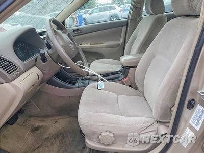 Zdjęcie 7 z 12 samochodu: 2003 TOYOTA CAMRY LE VIN:4T1BE32K33U658611 - miniatura