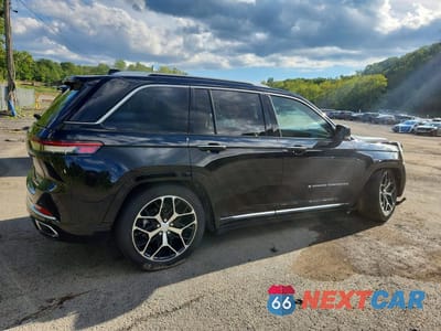Trzecie zdjęcie samochodu z tyłu: 2023 JEEP GRAND CHEROKEE SUMMIT 4XE VIN:1C4RJYE62P8792020 - miniatura
