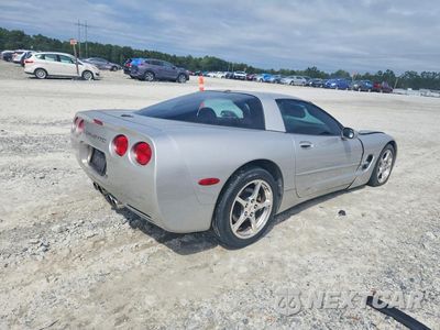 Trzecie zdjęcie samochodu z tyłu: 2004 CHEVROLET CORVETTE VIN:1G1YY22G445126526 - miniatura