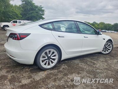 Trzecie zdjęcie samochodu z tyłu: 2023 TESLA MODEL 3 VIN:5YJ3E1EA9PF448688 - miniatura