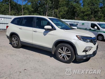 Czwarte zdjęcie samochodu z boku: 2017 HONDA PILOT EXL VIN:5FNYF5H53HB012865 - miniatura