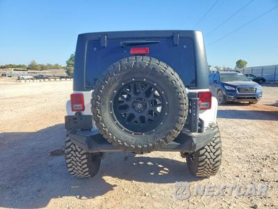 Zdjęcie 6 z 12 samochodu: 2015 JEEP WRANGLER UNLIMITED SPORT VIN:1C4BJWDG0FL666170 - miniatura