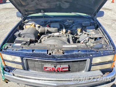 Zdjęcie 12 z 14 samochodu: 1997 GMC SUBURBAN C1500 VIN:1GKEC16R4VJ744912 - miniatura