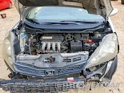 Zdjęcie 11 z 12 samochodu: 2012 HONDA FIT SPORT VIN:JHMGE8H50CC002637 - miniatura