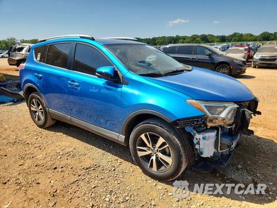 Czwarte zdjęcie samochodu z boku: 2018 TOYOTA RAV4 XLE VIN:JTMWFREV3JJ738971 - miniatura