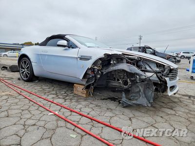 Czwarte zdjęcie samochodu z boku: 2010 ASTON MARTIN V8 VANTAGE VIN:SCFEFBBC5AGD14246 - miniatura