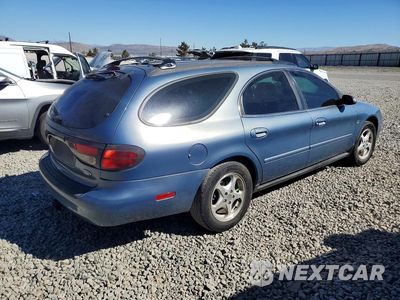 Trzecie zdjęcie samochodu z tyłu: 2000 FORD TAURUS SE VIN:1FAFP58S5YA205639 - miniatura