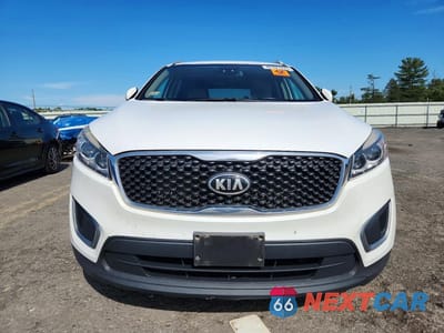 Piąte zdjęcie samochodu w środku: 2017 KIA SORENTO LX VIN:5XYPGDA31HG192836 - miniatura