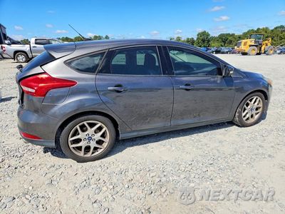 Trzecie zdjęcie samochodu z tyłu: 2015 FORD FOCUS SE VIN:1FADP3K2XFL270699 - miniatura