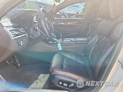 Zdjęcie 7 z 13 samochodu: 2021 BMW 750 XI VIN:WBA7U2C02MCG15843 - miniatura