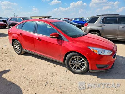 Czwarte zdjęcie samochodu z boku: 2017 FORD FOCUS SE VIN:1FADP3F21HL278557 - miniatura