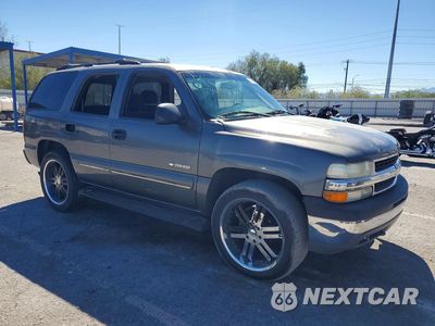 Czwarte zdjęcie samochodu z boku: 2000 CHEVROLET TAHOE C1500 VIN:1GNEC13T8YJ193438 - miniatura