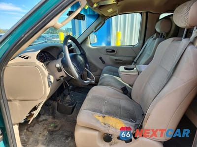 Zdjęcie 7 z 12 samochodu: 2002 FORD F150 VIN:2FTRX18W02CA81711 - miniatura
