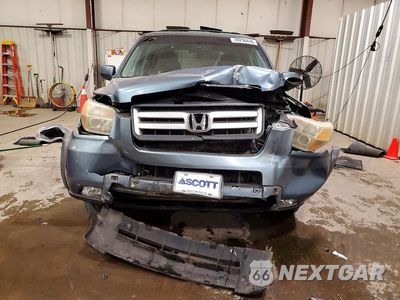 Piąte zdjęcie samochodu w środku: 2006 HONDA PILOT EX VIN:2HKYF18526H512636 - miniatura