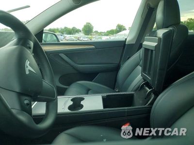Zdjęcie 7 z 13 samochodu: 2023 TESLA MODEL Y VIN:7SAYGDEE0PA128941 - miniatura