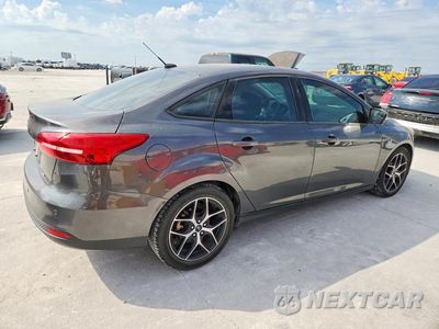 Trzecie zdjęcie samochodu z tyłu: 2017 FORD FOCUS SEL VIN:1FADP3H28HL318856 - miniatura