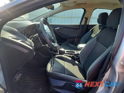 Zdjęcie 7 z 12 samochodu: 2014 FORD FOCUS SE VIN:1FADP3F29EL105025 - miniatura