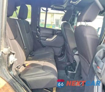 Zdjęcie 10 z 12 samochodu: 2014 JEEP WRANGLER UNLIMITED RUBICON VIN:1C4BJWFG7EL145104 - miniatura