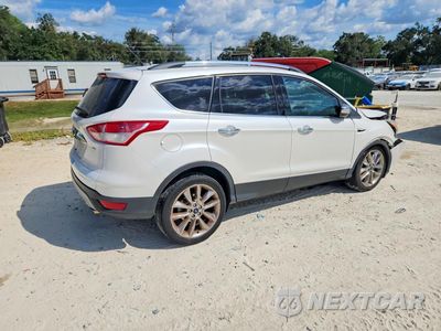 Trzecie zdjęcie samochodu z tyłu: 2016 FORD ESCAPE SE VIN:1FMCU0G76GUB85285 - miniatura