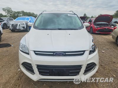 Piąte zdjęcie samochodu w środku: 2016 FORD ESCAPE TITANIUM VIN:1FMCU0JX3GUB67898 - miniatura