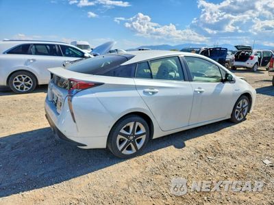 Trzecie zdjęcie samochodu z tyłu: 2017 TOYOTA PRIUS THREE TOURING VIN:JTDKARFU0H3048063 - miniatura