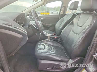Zdjęcie 7 z 12 samochodu: 2016 FORD FOCUS TITANIUM VIN:1FADP3J25GL249567 - miniatura