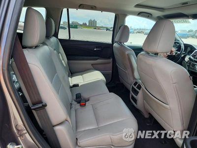 Zdjęcie 11 z 14 samochodu: 2020 HONDA PILOT EXL VIN:5FNYF6H56LB067079 - miniatura