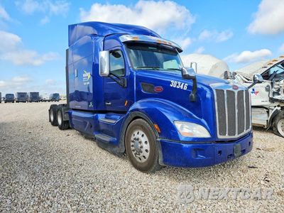 Czwarte zdjęcie samochodu z boku: 2020 PETERBILT 579 SEMI TRUCK VIN:1XPBDP9X8LD656402 - miniatura