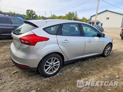 Trzecie zdjęcie samochodu z tyłu: 2017 FORD FOCUS SE VIN:1FADP3K24HL207617 - miniatura