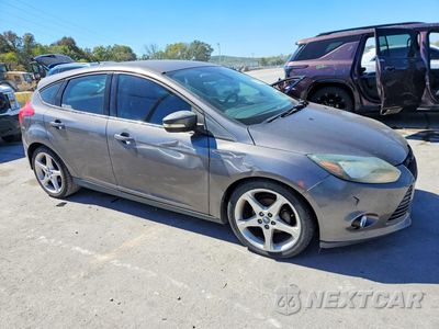 Czwarte zdjęcie samochodu z boku: 2012 FORD FOCUS TITANIUM VIN:1FAHP3N26CL213831 - miniatura