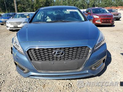 Piąte zdjęcie samochodu w środku: 2016 HYUNDAI SONATA HYBRID SE VIN:KMHE24L11GA033214 - miniatura