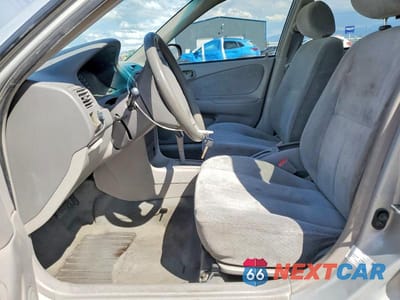 Zdjęcie 7 z 13 samochodu: 1999 TOYOTA COROLLA VE VIN:1NXBR12EXXZ165064 - miniatura