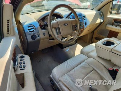 Zdjęcie 8 z 12 samochodu: 2004 FORD F150 VIN:1FTPX14504NC15182 - miniatura