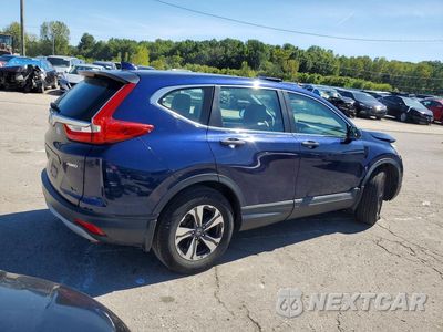 Trzecie zdjęcie samochodu z tyłu: 2017 HONDA CR-V LX VIN:2HKRW6H35HH200376 - miniatura