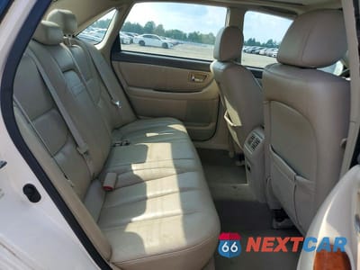 Zdjęcie 10 z 12 samochodu: 2002 TOYOTA AVALON XLS VIN:4T1BF28B12U263114 - miniatura