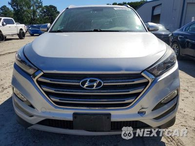 Piąte zdjęcie samochodu w środku: 2017 HYUNDAI TUCSON LIMITED VIN:KM8J33A28HU460679 - miniatura