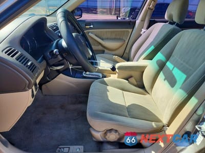 Zdjęcie 7 z 12 samochodu: 2004 HONDA CIVIC LX VIN:2HGES16594H602066 - miniatura