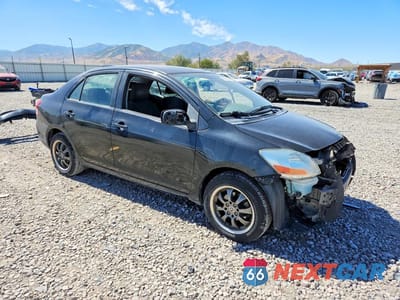 Czwarte zdjęcie samochodu z boku: 2009 TOYOTA YARIS BASE VIN:JTDBT903594060229 - miniatura