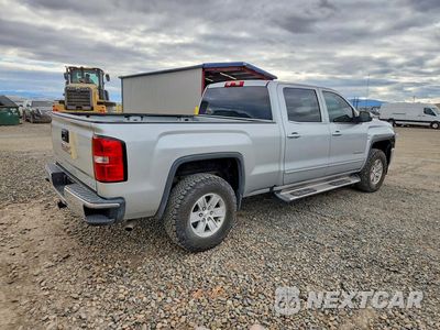 Trzecie zdjęcie samochodu z tyłu: 2017 GMC SIERRA K1500 SLE VIN:3GTU2MEC1HG194003 - miniatura