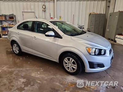 Czwarte zdjęcie samochodu z boku: 2014 CHEVROLET SONIC LT VIN:1G1JC5SG1E4101303 - miniatura