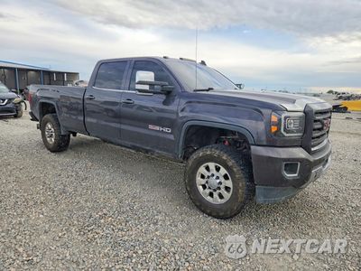 Czwarte zdjęcie samochodu z boku: 2015 GMC SIERRA K3500 SLT VIN:1GT423C83FF590974 - miniatura