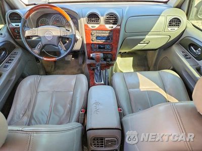 Zdjęcie 8 z 13 samochodu: 2006 GMC ENVOY DENALI VIN:1GKET63M062262567 - miniatura