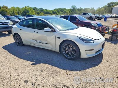 Czwarte zdjęcie samochodu z boku: 2023 TESLA MODEL 3 VIN:5YJ3E1EA1PF459801 - miniatura