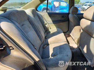 Zdjęcie 10 z 13 samochodu: 1999 NISSAN ALTIMA XE VIN:1N4DL01D4XC120019 - miniatura