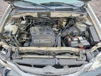 Zdjęcie 11 z 12 samochodu: 2002 MAZDA TRIBUTE LX VIN:4F2YU08132KM12067 - miniatura