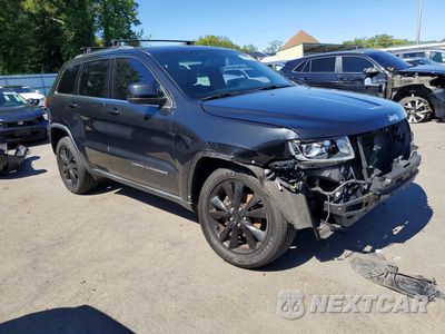 Czwarte zdjęcie samochodu z boku: 2014 JEEP GRAND CHEROKEE LAREDO VIN:1C4RJFAGXEC391909 - miniatura